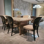 White Marble Dining Table with Woven Leather Side Panels and Polished Metal Frame